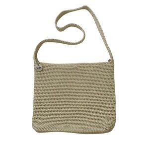 The Sak crocheted cream colored beachy coastal woven shoulder bag
